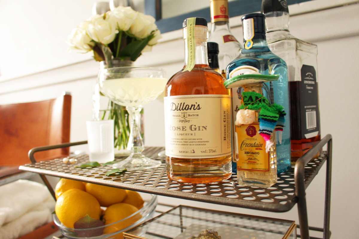 lf you have a vinyl record rack already or find a cheap one, you can easily transform it into a classy and chic bar cart! Perfect for small spaces too.