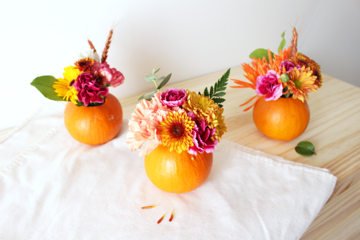 DIY mini pumpkin florals come in handy whether you're a guest or a hostess. You can bring these to a party as a hostess gift and if you're the host, create a beautiful table setting!