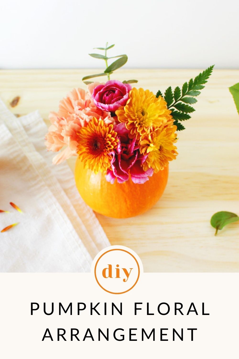 A mini pumpkin floral arrangement is the perfect touch for your Thanksgiving decor or fall table centrepiece.